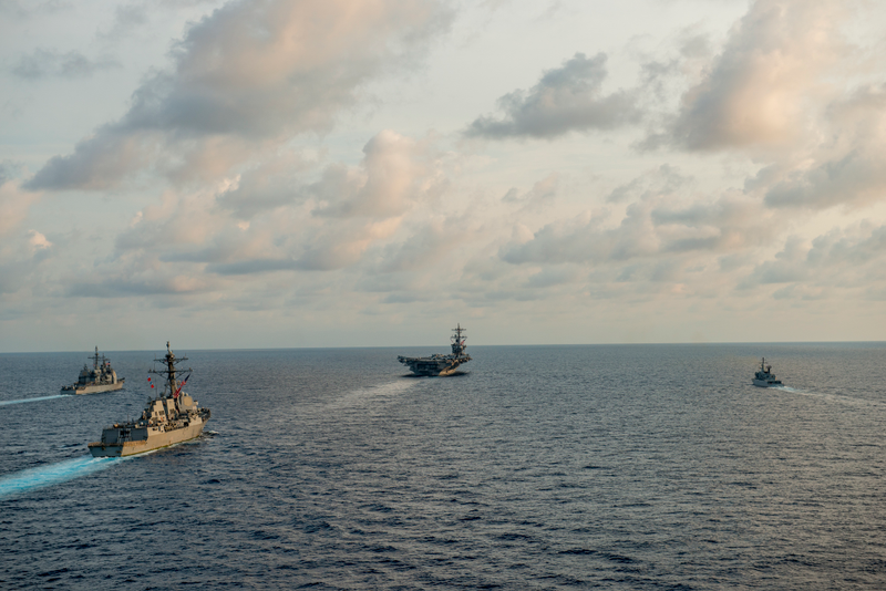 Illustration for article titled Navy Hornets Mock-Dogfight With Malaysian Flankers In South China Sea